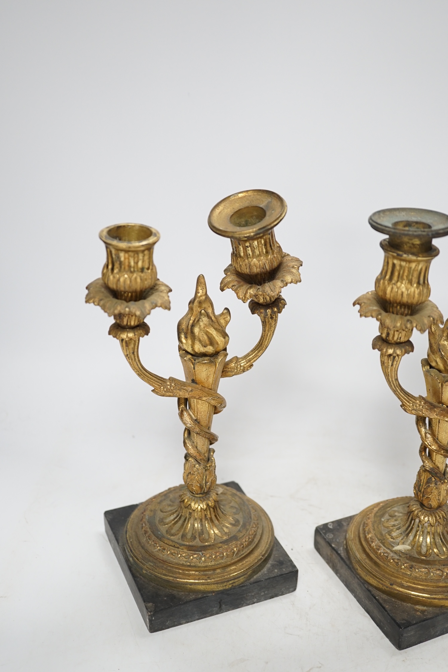 A pair of 19th century Louis XVI style gilt metal twin branch candelabra, 27cm. Condition - poor to fair